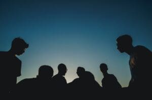 a picture of a group of people and all you can see is there silhouettes